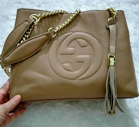 1990's gucci controllato 3268 apricot handbag|Gucci handbags logo.